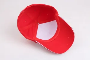 Red cotton 6-panel baseball cap with white piping and inner structure reinforcement