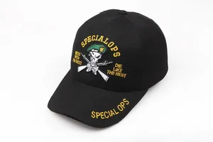 Close-up of Special Ops military skull embroidery on a black cotton baseball cap