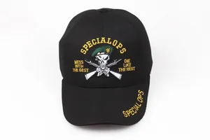 Close-up of Special Ops skull and rifle embroidery on a black tactical cotton baseball cap