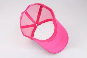 Pink mesh trucker hat with foam front interior view and breathable polyester structure