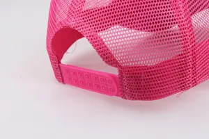 Detailed back view of pink mesh trucker hat featuring adjustable snapback closure