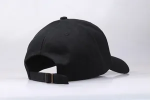 Black street style baseball cap featuring a vintage palm tree theme and adjustable metal buckle