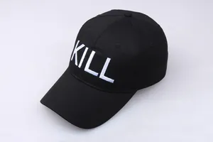 Close-up of black cotton baseball cap featuring thick white 3D KILL embroidery detail