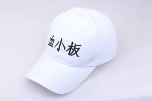 Close-up of white canvas baseball cap featuring black 'Cells at Work' embroidery