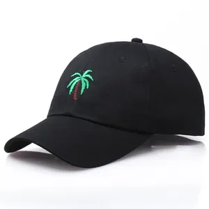Classic black cotton baseball cap featuring green palm tree embroidery on a curved brim
