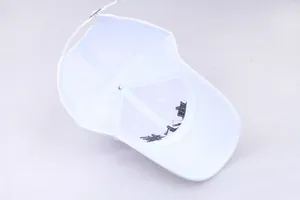 Detail view of the white baseball cap interior with reinforced seams and adjustable metal buckle