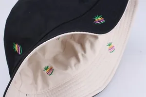 Wende-Anglerhut mit Ananas-Stickerei aus schwarzem und beigem Baumwoll-Twill-Gewebe