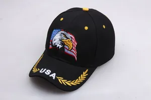 Close-up of eagle and USA flag embroidery on a black cotton baseball cap