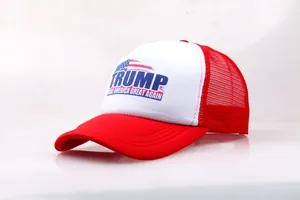 Detail of red and white Trump trucker hat with breathable mesh and American flag print