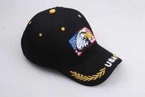 Detailed embroidery of an eagle and US flag on a black cotton twill baseball cap