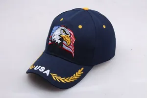 Detailed embroidery of bald eagle and USA flag on dark blue cotton baseball cap