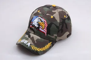 Detailed close-up of eagle and US flag embroidery on the camouflage baseball cap