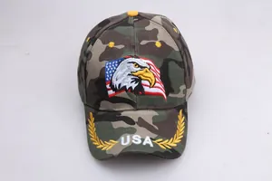 Detailed embroidery of an eagle and US flag on a camouflage cotton baseball cap