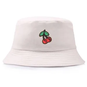 Chic beige cotton bucket hat with embroidered cherry pattern and flat top design