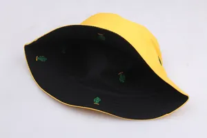 Close-up of green cactus embroidery on yellow bucket hat with high-quality stitching