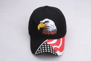 Detailed embroidery of an eagle head and American flag design on a black baseball cap