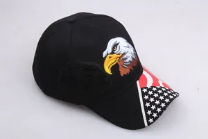 Close-up of eagle embroidery and US flag pattern on a black baseball cap side view