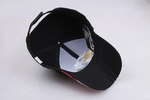 Detailed interior of baseball cap showing eagle embroidery and reinforced stitching