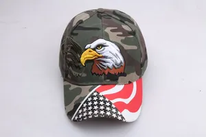 Macro shot of detailed bald eagle embroidery and star stripes on camo baseball cap