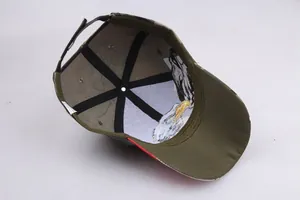 Detail view of camouflage baseball cap interior with bald eagle print and velcro strap
