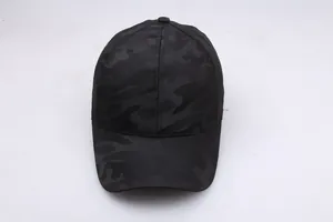 Front view of dark camouflage baseball cap with six-panel design and curved brim