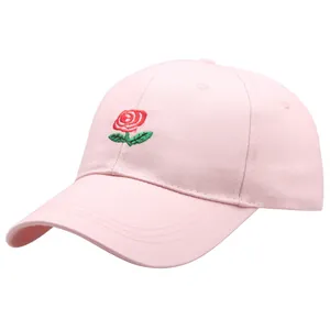 Pink cotton baseball cap with red rose embroidery and curved brim for outdoor sun protection