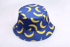 Detailed stitching on blue bucket hat brim with yellow banana pattern print