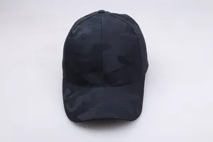 Detailed view of breathable mesh fabric on dark blue camo outdoor baseball cap