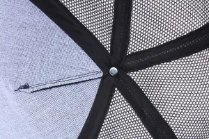 Detail of internal reinforced stitching and breathable mesh on a baseball cap