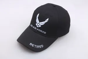 Detail view of U.S. AIR FORCE embroidery and RETIRED text on black cotton baseball cap