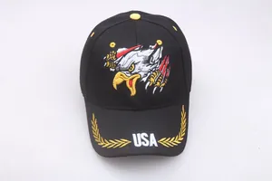 Close-up of eagle embroidery with USA lettering and wheat ears on a black cotton cap