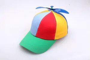 Detailed view of the colorful spinning propeller and multi-colored panels on the baseball cap