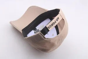 Detail of khaki baseball cap interior with sweatband and Air Force velcro strap