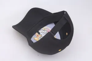 Detailed interior view of a black baseball cap with adjustable strap and reinforced sweatband