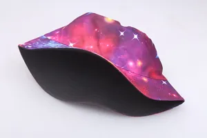 Detail of galaxy print bucket hat with purple and blue starry pattern and black lining