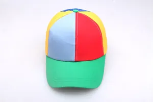 Top view of a colorful patchwork baseball cap in red, yellow, blue, and green canvas