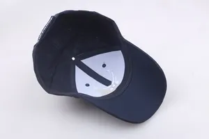 Close-up of Navy Air Force baseball cap with white embroidery and breathable mesh holes