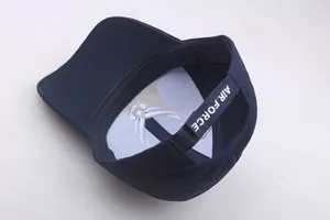 Detail of navy cotton baseball cap with adjustable Air Force velcro strap and interior embroidery
