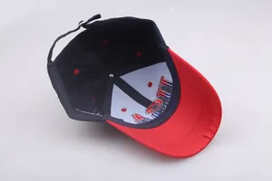 Detailed interior of cotton baseball cap showing reinforcement lining and metal buckle strap