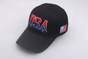 Detailed embroidery of USA letters and American flag patch on a black cotton baseball cap