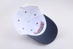Classic white and navy cotton baseball cap with embroidered American flag details