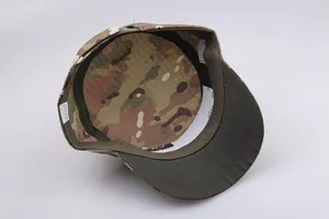 Inside view of camouflage military flat top cap showing black sweatband and cotton label