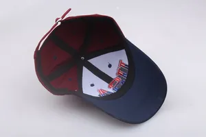 Detail of adjustable metal buckle and inner structure on a cotton USA baseball cap