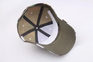 Inside view of camo baseball cap showing reinforced stitching and moisture wicking band