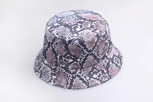 Double-sided reversible bucket hat featuring a purple and pink snake print pattern