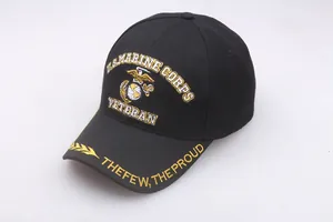 Detail of US Marine Corps veteran embroidery on a black cotton baseball cap