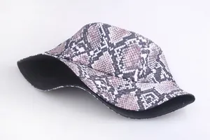 Double-sided bucket hat with snakeskin print and solid black lining for street fashion
