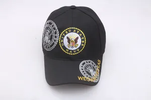 Detail of United States Navy embroidery and We Own The Seas text on black cotton cap