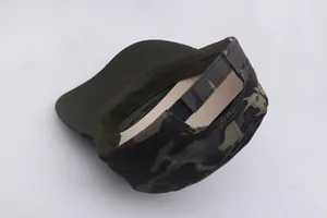Detail view of camouflage patrol cap with adjustable velcro strap and internal support