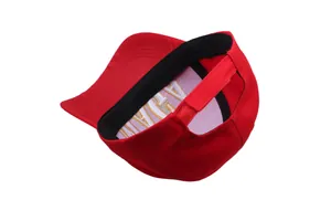 Detail view of red MAGA baseball cap back with adjustable velcro strap and sweatband